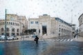 center of jerusalem. Central square, administrative buildings, large houses, few people, rain