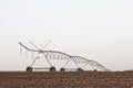 A center modern pivot irrigation system Royalty Free Stock Photo