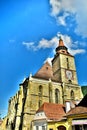 Center of the old town of Brasov City Black Church Transilvania, Romania. In background you can see Tampa mountain 955 m Royalty Free Stock Photo