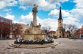 Center of the old town. Holy trinity and Roman Catholic Churchon the city plaza. Main square of city in southern Slovakia. Nove