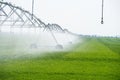 Center Pivot Irrigation System in a green Field Royalty Free Stock Photo