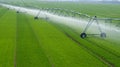 Center Pivot Irrigation System in a green Field Royalty Free Stock Photo