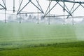 Center Pivot Irrigation System in a green Field Royalty Free Stock Photo