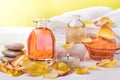 Spa still life, rose petals with bath salts and perfumed essences Royalty Free Stock Photo