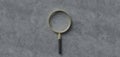 Centered magnification glass on concrete background - 3d illustration