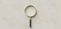 Centered magnification glass on paper background - 3d illustration