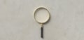 Centered magnification glass on paper background - 3d illustration