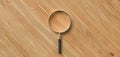 Centered magnification glass on wooden background - 3d illustration