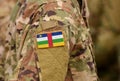 Central African Republic flag on soldiers arm. Central African Republic troops collage Royalty Free Stock Photo