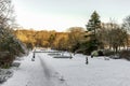 Central alley of Seaton park covered with snow in a nice sunny day, Aberdeen, Scotland Royalty Free Stock Photo