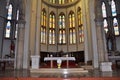 Central altar and stained glass windows in the background of the Capuchin Church of Our Lady of Lourdes in Rijeka.