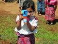 Central American Girl with a Bubble Machine