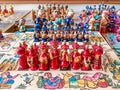 Central Asia. Handmade wooden colorful chess in the form of Uzbek figures