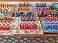 Central Asia. Handmade wooden colorful chess in the form of Uzbek figures