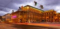 Central avenue of Vienna and illuminated State Opera at winter twilight