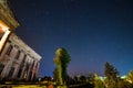 Central building of count Potocki palace, Tulchyn, Vinnytsia region, Ukraine, on a warm spring night against clear dark blue sky Royalty Free Stock Photo