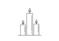 The central candle is the tallest, flanked by two shorter ones on either side Royalty Free Stock Photo