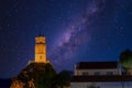 Central clock in the town of Arachova in Greece against the milky way. Royalty Free Stock Photo