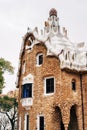 The central entrance to The Park Guell in Barcelona. Gingerbread houses. Left-handed, guardhouse.