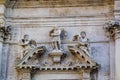 The central fragment of the facade of the Catholic Church of St. Vlach. Stradun Street, Dubrovnik, Croatia