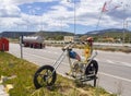 Central Greece, June 2020: Art object skeleton on a motorcycle-chopper Ghost rider on the autobahn in Greece Royalty Free Stock Photo