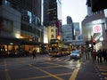 A photo of one of the many doubledeck buses driving around on Des Voeux Road Central in