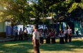 CENTRAL JAVA, INDONESIA - JANUARY 17, 2020: A student as the leader of the ceremony arranges his troops to be ready, lined up neat