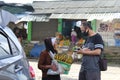 Banana sellers offer their wares during the Covid-19 period