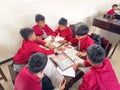 A group of students are learning to recognize and translate Javanese script in the classroom. Royalty Free Stock Photo