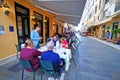 Central Kapodistriou street in Corfu, full of tourists eating in various restaurants