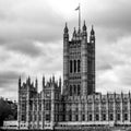 Seat Of UK Government Palace of Westminster With Union Flag Flying Under A Cloudy Sky