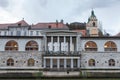 Central Market of Ljubljana, capital city of Slovenia, taken during a cloudy rainy day, with the Ljubljanica river on foreground.