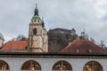 Central Market of Ljubljana, taken during a cloudy rainy day, the Ljubljana Cathedral, and Ljubljana Castle can be seen Royalty Free Stock Photo