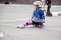 Central Park. Children competition in roller sport.A little girl on roller skates