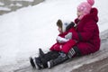 Central Park.Kids slide down the hill