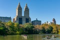 Central Park Lake with Boats during Autumn and Skyscrapers in New York City Royalty Free Stock Photo