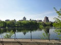 Central Park reservoir Upper West Side skyline blue sky Manhattan New York City USA Royalty Free Stock Photo