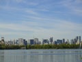 Central Park reservoir Upper West Side skyline blue sky Manhattan New York City USA Royalty Free Stock Photo