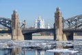The central part of Peter the Great bridge and the Smolny Cathedral during the spring ice drift. Saint-Petersburg Royalty Free Stock Photo