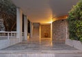 Central perspective of elegant house entrance night view