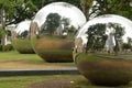 Singapore central gardens reflected in a modern sculpture