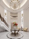 The central round foyer in the interior is classic in style with a spiral staircase and wrought iron railings and a seating area Royalty Free Stock Photo