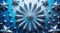 Silver Starburst and Scattered Stars on Blue Sparkly Background Royalty Free Stock Photo