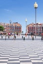 Nice, Provance, Alpes, Cote d`Azur, French July 31, 2018; The pavement on Massena Square with black and white stone slaps.