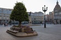 The central square in Spain is the city of A Coruna, Galicia. Bench decorated with flowers, place to relax