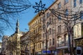 Central Street with Building Facades at Christmas