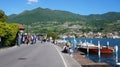 Central Street and harbor of Peschiera Maraglio on the island of Monte Isola, Lake Iseo, Italy Royalty Free Stock Photo