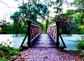 Wooden bridge to an island on a lake