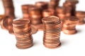 Cents of euro coins piles on white background