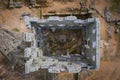Centum Cellas mysterious ancient tower drone aerial to above view in Belmonte, Portugal